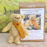 Bananaby standing beside the Bananaby Teddy Bear Kit box