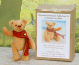 Clementine standing beside the Clementine Teddy Bear Kit box