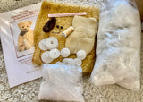 We have created this kit with everything you need including the stuffing and pellets, you just need scissors and a few things you will have at home. We can supply the kit without stuffing and pellets as they can be expensive to post overseas. Barbara has drawn out the pattern on the mohair but the paper pattern included is reusable, she has also sewn the paw pads with double layers of felt for you, to make them more durable.