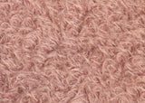 Strawberry Fool 16 mm pink mohair for teddy bears with a beautiful distressed pile.  Strawberry Fool mohair has a wonderful pink distressed pile. The mohair has an old or vintage feel, It's a great colour for smaller traditional teddy bears, or larger bears that you want to look old and loved.