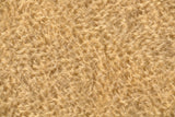 Biscuit 9 mm quite sparse, straight pile, mohair for teddy bears with a soft faded gold pile and backing by Make A Teddy