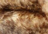 Chocolate Chip Truffle 25 mm (one inch) chestnut brown tipped beige dense, distressed mohair for teddy bears with a beige backing Chocolate Chip Truffle is a gorgeous chestnut brown-tipped beige mohair with a soft and fluffy 1 inch pile. It's a great colour and texture for medium and large teddy bears. The backcloth is also beige meaning that if you trim the snout of your bear it will have a pale beige snout and an interesting mottled brown and cream colouring.
