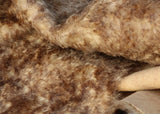 Chocolate Chip Truffle 25 mm (one inch) chestnut brown tipped beige dense, distressed mohair for teddy bears with a beige backing Chocolate Chip Truffle is a gorgeous chestnut brown-tipped beige mohair with a soft and fluffy 1 inch pile. It's a great colour and texture for medium and large teddy bears. The backcloth is also beige meaning that if you trim the snout of your bear it will have a pale beige snout and an interesting mottled brown and cream colouring.