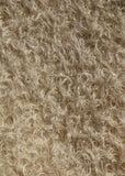 Clootie, 24 mm (nearly one inch) blond, dense, distressed mohair/viscose mix for teddy bears with a pale beige backing Clootie is a little different from out other materials, the pile is a mixture of mohair and viscose giving it a slight lustre. It has an intensely distressed tangled, blond/pale beige pile which is 24 mm (nearly) 1 inch long. It's a great colour and texture for medium and large traditional teddy bears, it's a proper 'teddy bear' colour.
