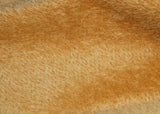Golden Corn 9 mm quite sparse, straight pile, Steiff Schulte mohair for teddy bears with a bright gold pile and pale tan backing.t's a great colour for smaller traditional teddy bears, or larger bears that you want to look old and loved. We know several teddy bear makers who use this mohair to make teddy bears with a really aged distressed feel, maybe because it's such a good 'teddy bear gold' it's a good starting point for making a bear look old.