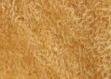 Golden Corn 9 mm quite sparse, straight pile, Steiff Schulte mohair for teddy bears with a bright gold pile and pale tan backing.t's a great colour for smaller traditional teddy bears, or larger bears that you want to look old and loved. We know several teddy bear makers who use this mohair to make teddy bears with a really aged distressed feel, maybe because it's such a good 'teddy bear gold' it's a good starting point for making a bear look old.