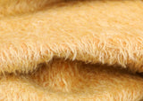 Golden Cracker 12 mm quite sparse, distressed (ratinee) mohair for teddy bears with a golden pile and warm beige backing This has a moderately short, distressed, fairy sparse, golden pile and a warm beige backing, which helps make your bear's face stand out.  It's a great colour for smaller traditional teddy bears, or larger bears that you want to look old and loved.