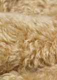Honey Truffle 25 mm (one inch) blond gold, dense, distressed mohair for teddy bears with a warm beige backing Honey Truffle is a gorgeous blond gold mohair with a soft and fluffy 1 inch pile. It's a great colour for medium and large traditional teddy bears, it's a proper 'teddy bear' colour.