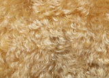 Honey Truffle 25 mm (one inch) blond gold, dense, distressed mohair for teddy bears with a warm beige backing Honey Truffle is a gorgeous blond gold mohair with a soft and fluffy 1 inch pile. It's a great colour for medium and large traditional teddy bears, it's a proper 'teddy bear' colour.
