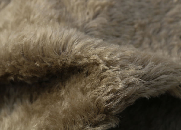 Mudcake is a luxurious brown mohair with a hint of green and a soft and fluffy 20 mm pile. It's a great colour for medium and large traditional teddy bears, the green tinge makes it particularly suitable for bears you want to look old and have a bit of character.