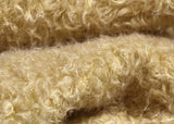Mustard Seed, 24 mm (nearly one inch) blond, dense, distressed mohair/viscose mix for teddy bears Mustard Seed is a little different from our other materials, the pile is a mixture of mohair and viscose giving it a slight lustre. It has an intensely distressed tangled, blond pile which is 24 mm (nearly) 1 inch long. It's a great colour and texture for medium and large traditional teddy bears, it's quite a 'happy'teddy bear' colour, a good colour for making happy teddy bears.