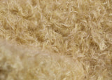 Mustard Seed, 24 mm (nearly one inch) blond, dense, distressed mohair/viscose mix for teddy bears Mustard Seed is a little different from our other materials, the pile is a mixture of mohair and viscose giving it a slight lustre. It has an intensely distressed tangled, blond pile which is 24 mm (nearly) 1 inch long. It's a great colour and texture for medium and large traditional teddy bears, it's quite a 'happy'teddy bear' colour, a good colour for making happy teddy bears.