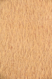 Peanut Relish 12 mm quite sparse, distressed (ratinee) mohair for teddy bears with a caramel pile and pale tan backing This has a moderately short, distressed, fairy sparse, caramel gold (quite like a peanut's colour) pile and a pale tan backing, which helps make your bear's face stand out.  It's a great colour for smaller traditional teddy bears, or larger bears that you want to look old and loved.