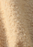 Porridge 11 mm quite sparse, wildly distressed, mohair for teddy bears with a soft, pale peachy cream pile and backing. It's a great mohair for smaller traditional teddy bears, or larger bears, good for cute happy bears, or ,with some shading, teddies that you want to look old and loved.