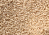 Porridge 11 mm quite sparse, wildly distressed, mohair for teddy bears with a soft, pale peachy cream pile and backing. It's a great mohair for smaller traditional teddy bears, or larger bears, good for cute happy bears, or ,with some shading, teddies that you want to look old and loved.