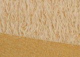 Shortcake 12 mm quite sparse, distressed (ratinee) mohair for teddy bears with a soft beige pile and backing This has a moderately short, distressed, fairy sparse, beige pile and a slightly warmer beige backing, which helps make your bear's face stand out a little.  It's a great colour for smaller traditional teddy bears, or larger bears that you want to look old and loved.