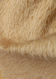 Shortcake 12 mm quite sparse, distressed (ratinee) mohair for teddy bears with a soft beige pile and backing This has a moderately short, distressed, fairy sparse, beige pile and a slightly warmer beige backing, which helps make your bear's face stand out a little.  It's a great colour for smaller traditional teddy bears, or larger bears that you want to look old and loved.