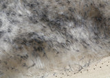 Smoked Truffle 25 mm (one inch) charcoal tipped cream, dense, distressed mohair for teddy bears with a cream backing Smoked Truffle is a gorgeous charcoal-tipped cream mohair with a soft and fluffy 1 inch pile. It's a great colour and texture for medium and large teddy bears. The backcloth is also cream meaning that if you trim the snout of your bear it will have a cream snout and an interesting smoky colouring.