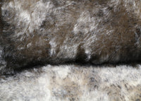 Smoked Truffle 25 mm (one inch) charcoal tipped cream, dense, distressed mohair for teddy bears with a cream backing Smoked Truffle is a gorgeous charcoal-tipped cream mohair with a soft and fluffy 1 inch pile. It's a great colour and texture for medium and large teddy bears. The backcloth is also cream meaning that if you trim the snout of your bear it will have a cream snout and an interesting smoky colouring.