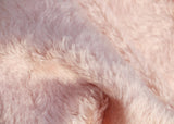 Strawberry Milkshake 20 mm soft pink, dense, mohair for teddy bears with a slight swirl in the pile and a beige backing Strawberry Milkshake is a gorgeous pale pink mohair with a soft and fluffy pile. It's a great colour for small, medium and large traditional teddy bears, if you can imagine a strawberry milkshake you have a very good idea of its colour.