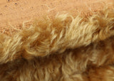 Truffle 25 mm (one inch) antique gold, dense, distressed mohair for teddy bears with a cinnamon backing Truffle is a gorgeous antique gold/cinnamon mohair with a soft and fluffy 1 inch pile. It's a great colour for medium and large traditional teddy bears, it's a proper, old fashioned 'teddy bear' colour.