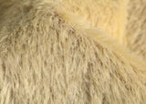 Wholemeal Spaghetti is a blond gold mohair with hint of green and a soft and fluffy pile, its backing is a dull brown this means that your bear will have contrasting brown facial features when you trim the snout.