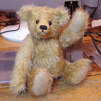 Brannigan waving. 
Brannigan Mohair Teddy Bear Kit. A jointed teddy bear kit by Make A Teddy to make an 8.5 inch/22 cm teddy bear.
We have created this kit with everything you need with lovely beige German mohair, apart from scissors and a few things you will have at home. The instructions are thorough and illustrated