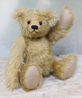 Brannigan waving. Brannigan Mohair Teddy Bear Kit. A jointed teddy bear kit by Make A Teddy to make an 8.5 inch/22 cm teddy bear.
We have created this kit with everything you need with lovely beige German mohair, apart from scissors and a few things you will have at home. The instructions are thorough and illustrated