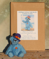 Chuffington teddy bear sitting in front of the kit box. The Chuffington teddy bear kit is nicely packaged in a box and ready for Birthdays or Christmas and we can put in one of our own gift tags and a Birthday or Christmas card from our own drawings for free if you ask us to.