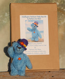 Chuffington teddy bear standing next to the kit box and waving. The Chuffington teddy bear kit is nicely packaged in a box and ready for Birthdays or Christmas and we can put in one of our own gift tags and a Birthday or Christmas card from our own drawings for free if you ask us to.