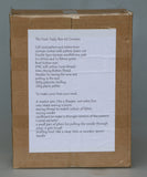 Hank teddy bear kit in its box with a list of contents on a grey background