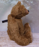 Harrison teddy bear sitting down shown in profile.
Harrison Traditional Mohair Heirloom Teddy Bear Kit. A jointed teddy bear kit by Make A Teddy to make a 14 inch (35 cm) teddy bear. We have created this kit with everything you need with clear instructions with diagrams, you just need scissors and a few things you will have at home.