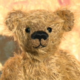 Mainwaring's face showing his black glass eyes and black cotton nose and mouth. A bear made from the Mainwaring Mohair Teddy Bear Kit. A jointed teddy bear kit in brown mohair by Make A Teddy to make an 8 inch/20 cm teddy bear.