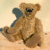 Mainwaring sitting down, a bear made from the Mainwaring Mohair Teddy Bear Kit. A jointed teddy bear kit in brown mohair by Make A Teddy to make an 8 inch/20 cm teddy bear.