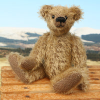 Mainwaring sitting down, a bear made from the Mainwaring Mohair Teddy Bear Kit. A jointed teddy bear kit in brown mohair by Make A Teddy to make an 8 inch/20 cm teddy bear.