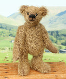 Mainwaring standing, a bear made from the Mainwaring Mohair Teddy Bear Kit. A jointed teddy bear kit in brown mohair by Make A Teddy to make an 8 inch/20 cm teddy bear.