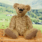 Mainwaring sitting down, a bear made from the Mainwaring Mohair Teddy Bear Kit. A jointed teddy bear kit in brown mohair by Make A Teddy to make an 8 inch/20 cm teddy bear.