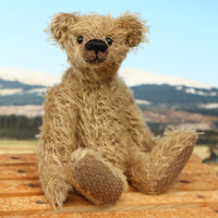 Mainwaring sitting down, a bear made from the Mainwaring Mohair Teddy Bear Kit. A jointed teddy bear kit in brown mohair by Make A Teddy to make an 8 inch/20 cm teddy bear.