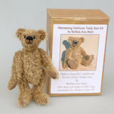 Mainwaring teddy bear standing beside his kit box