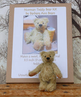 Norman teddy bear with the box containing the Norman teddy bear kit