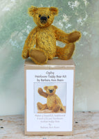 Ogilvy sitting on top of the kit box. Ogilvy Mohair Teddy Bear Kit. A jointed teddy bear kit by Make A Teddy to make a 9 inch/23 cm teddy bear.