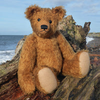 Harrison teddy bear sitting down on a log on the beach in Girvan, south west Scotland.
Harrison Traditional Mohair Heirloom Teddy Bear Kit. A jointed teddy bear kit by Make A Teddy to make a 14 inch (35 cm) teddy bear. We have created this kit with everything you need with clear instructions with diagrams, you just need scissors and a few things you will have at home.