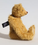 Rafferty is a very sweet teddy bear and he's quite easy to make. Rafferty has beautiful distressed antique gold German mohair, German wool felt pads and genuine Victorian boot button eyes.