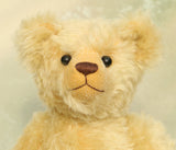 Sandy Teddy Bear Kit by Make A Teddy, showing our Sandy teddy bear 's face made from beautiful gold mohair with boot button eyes and a chestnut coloured nose embroidered from DMC soft cotton