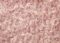 Strawberry Fool 16 mm pink mohair for teddy bears with a beautiful distressed pile.  Strawberry Fool mohair has a wonderful pink distressed pile. The mohair has an old or vintage feel, It's a great colour for smaller traditional teddy bears, or larger bears that you want to look old and loved. 