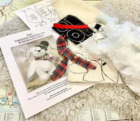 The Theo kit Includes..
Reusable pattern with plenty of detailed instructions and diagrams
White 12mm sparse mohair with the pattern already drawn out ready to cut out
Plastic safety joints x5
Felt pieces for hat, along with the decorative beads and felt holly leaves.
Finished tartan scarf and yellow glass bead
Black glass eyes 7mm
Extra strong thread
A needle for inserting the eyes and embroidering the nose
Perle cotton nose thread , black.
75g polyester stuffing
100 glass beads
Our contact details