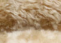 Champagne 24 mm (nearly one inch) blond, dense, distressed mohair for teddy bears with a warm beige backing Champagne is a gorgeous blond gold mohair with a soft and fluffy (nearly) 1 inch pile. It's a great colour for medium and large traditional teddy bears, it's a proper 'teddy bear' colour. 
