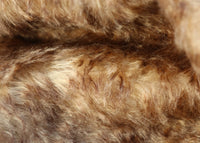 Chocolate Chip Truffle 25 mm (one inch) chestnut brown tipped beige dense, distressed mohair for teddy bears with a beige backing Chocolate Chip Truffle is a gorgeous chestnut brown-tipped beige mohair with a soft and fluffy 1 inch pile. It's a great colour and texture for medium and large teddy bears. The backcloth is also beige meaning that if you trim the snout of your bear it will have a pale beige snout and an interesting mottled brown and cream colouring. 