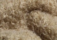 Clootie, 24 mm (nearly one inch) blond, dense, distressed mohair/viscose mix for teddy bears with a pale beige backing Clootie is a little different from out other materials, the pile is a mixture of mohair and viscose giving it a slight lustre. It has an intensely distressed tangled, blond/pale beige pile which is 24 mm (nearly) 1 inch long. It's a great colour and texture for medium and large traditional teddy bears, it's a proper 'teddy bear' colour. 