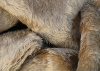 Fudge 20 mm soft brown mohair for teddy bears with a slight swirl in the pile and a brown backing Fudge is a luxurious brown mohair with a soft and fluffy pile and a beige backing. It's a great colour for medium and large traditional teddy bears, it's soft colour makes it particularly suitable for bears you want to look old and have a bit of character.